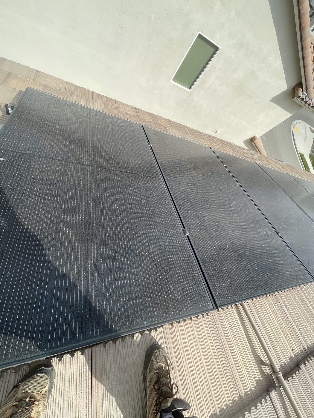 Dusty solar panels covered in dirt before cleaning by Window Wizards in Los Angeles