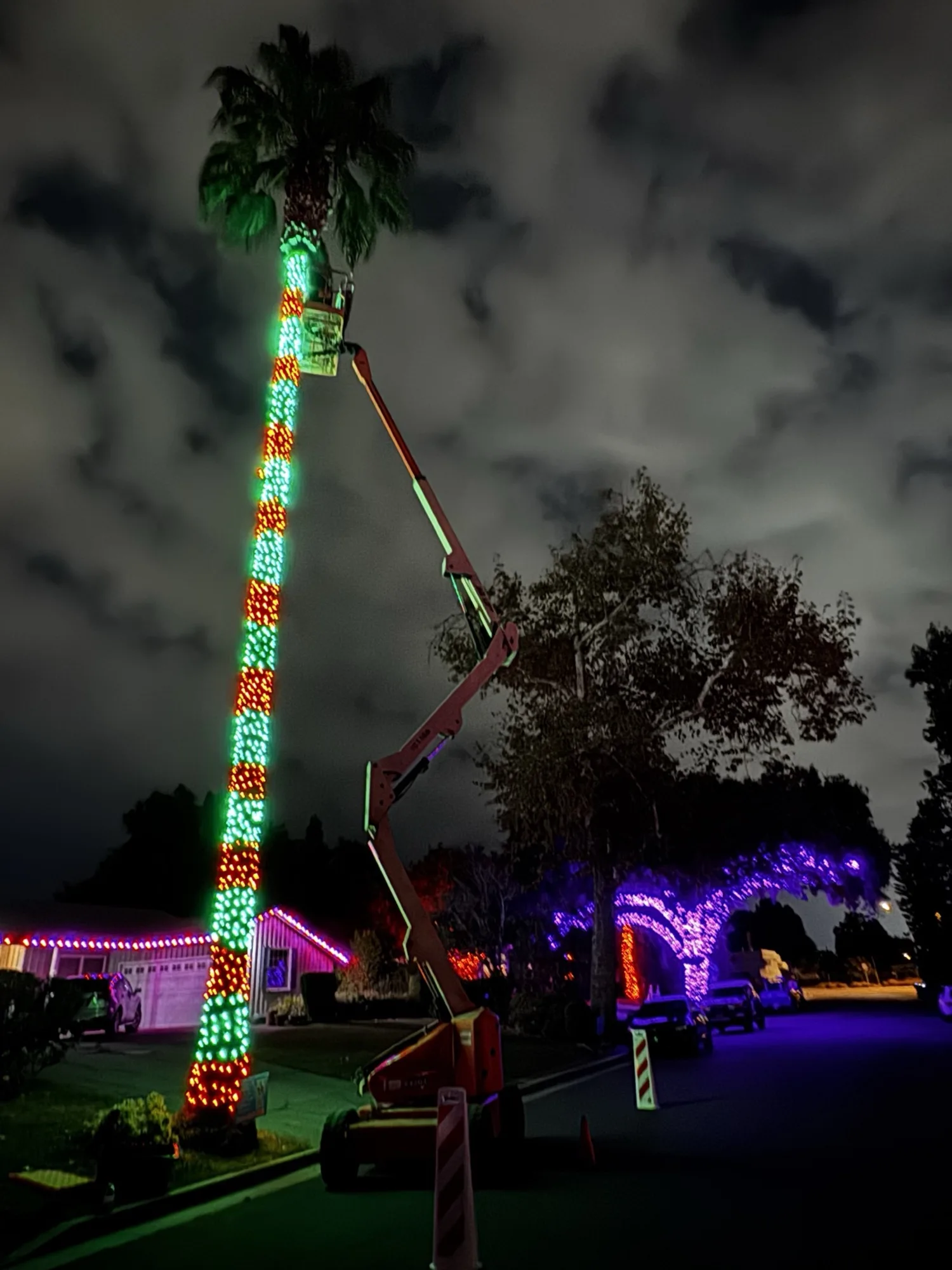 626 Christmas crew installing holiday lights at night